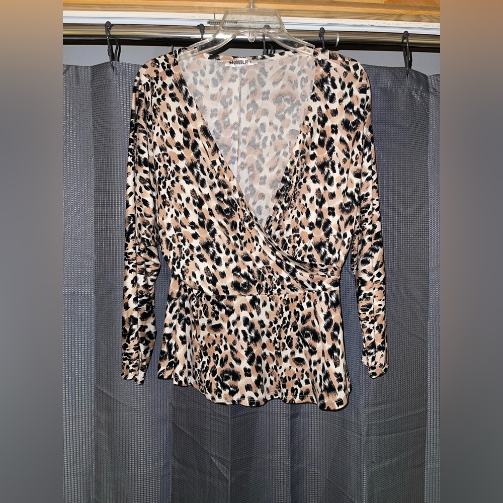Cheetah Cross V Neck Top.